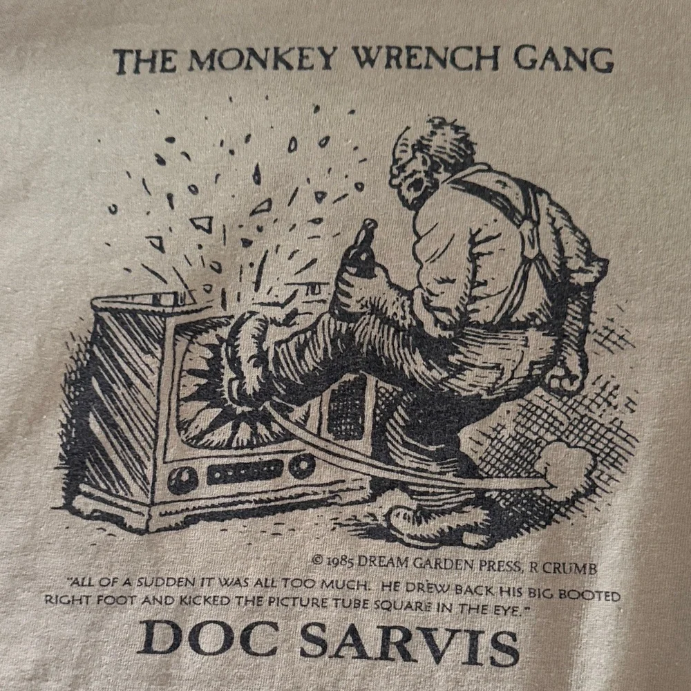 Port and Company Olive Green 'The Monkey Wrench Gang' Doc Sarvis Graphic Tee - Picture 3 of 7